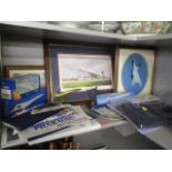 A collection of Concorde memorabilia to include signed prints, collectors plates and other items