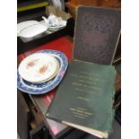 A mixed lot to include etchings, an atlas, a Staffordshire platter and other items