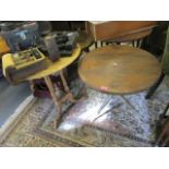 A late Victorian/Edwardian cricket table with later circular top on gilt wood base, and an early