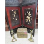 A Japanese Shibayama two fold table screen, a pair of brass candlesticks and an embossed brass