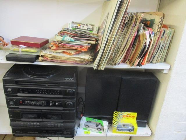 A mixed lot to include 45rpm records, an Alba stacking system, cased cutlery and other items