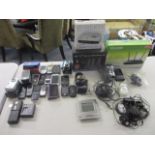 A selection of mobile phones BT8610 house phones, TP - Link AC 1350 wireless dual-band router and