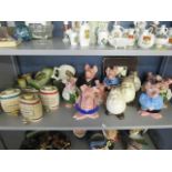 A mixed lot of ceramics to include Wade Nat West pig money boxes and spirit barrels, onion shaped