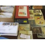 Approximately one hundred Great War and other postcards, a stamp album with a small selection of