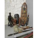 A quantity of African and South American carved wooden tribal art and other items