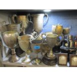 A collection of silver plated horse and agriculture related trophies