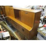 A mid 20th century G-Plan teak side cabinet 48"h x 74"w