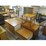 Mixed teak furniture to include a sideboard, three chests of drawers, an occasional table and a