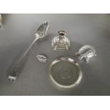 Mixed silver and white metal items to include a Georgian silver berry spoon, a George V one rupee