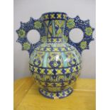 A Cantagalli twin handled vase painted with geometric panels and flower heads, A/F, 10 3/4"h