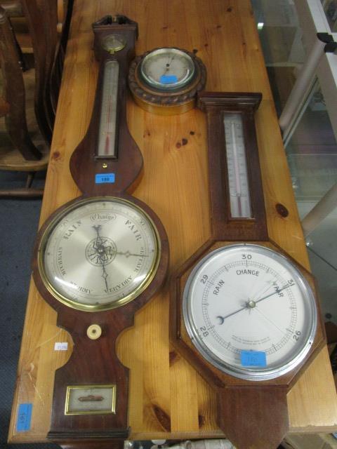 W Youle, a Georgian cased banjo barometer with ivory wheel adjuster, the level marked W Youle, 79