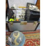 A miscellaneous lot to include a small trunk, comical treen doorstops, clothing, vintage cards and a