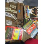 A selection of football programs, a wooden rattle, Esso coins and other items to include a 1974