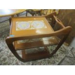 A mid 20th century teak three-tier trolley 29" x 31"w