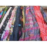 A selection of ladies scarves to include silk and cashmere examples, a Guggenheim Museum scarf in