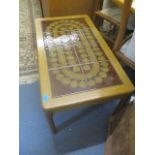 A retro walnut and tiled topped coffee table, 16" x 36 2/8" x 20 1/2"