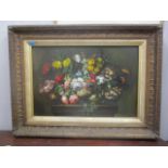 A mid 20th century Dutch style still life of flowers, oil on board in a gilt frame