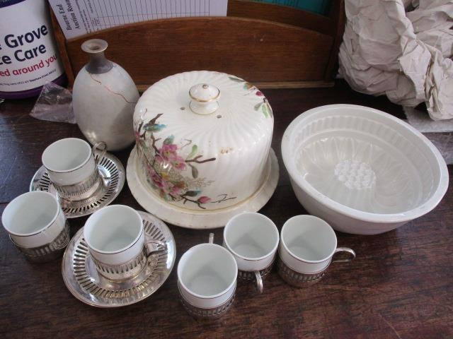 A mixed lot to include coffee cans and saucers, a Victorian cheese dish and a jelly mould