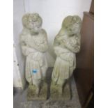 A pair of composition garden statues of classical ladies 32"h