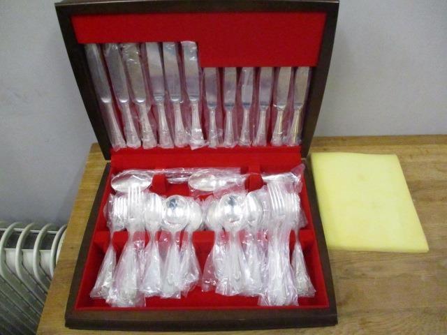 An Ashberry silver plated canteen of Louis XV pattern cutlery and flatware