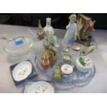 A mixed lot to include Wedgwood Nao figurines, a silver topped glass trinket pot, dressing table