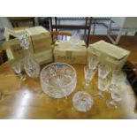 A selection of cut glass to include a decanter, red wine, brandy sets of six glasses, a glass bowl