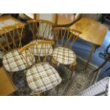 A mid 20th century Ercol fall flap table 28"h x 40 1/2"w, together with four stick back chairs