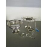 Two silver footed dishes, a small salt pot and two salt spoons, a silver pill box and a beige fan,