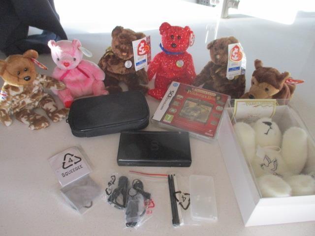 A 2006 Nintendo black DS Lite games and accessories, together with six Beanie Babies to include a