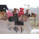 A 2006 Nintendo black DS Lite games and accessories, together with six Beanie Babies to include a