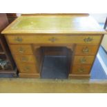 An early 20th century mahogany pedestal desk with raised back and green leather scriber 29" x 40"