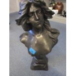 A bronzed bust of a young lady with long flowing hair, singed Goyeau