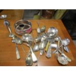 A selection of silver plate to include cutlery, a wine coaster and others