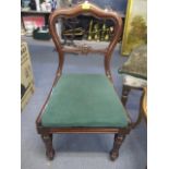 A Victorian mahogany dining chair on fluted legs