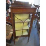 An early 20th century mahogany and painted display cabinet, on square, tapering legs