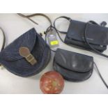 A Lonchamp black leather shoulder bag and two others, together with a decorative leather ball