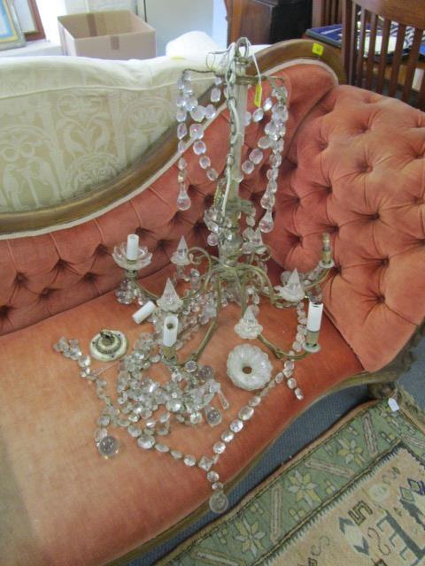 A silver plated metal ceiling five-branch chandelier with faceted cut spires and swag drops A/F