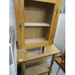 A small pine table together with a pine wall hanging cabinet, a pine wash stand and two prints