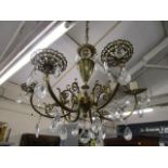 A French brass six branch ceiling hanging light with crystal drops, rewired