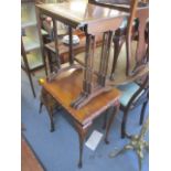 An early 20th century nesting set of three mahogany occasional tables and a walnut occasional table,