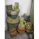 A selection of garden pots and ornaments, together with garden stepping stones