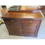 A late Victorian walnut cabinet with two short drawers and a pair of doors, 37 1/2"h x 47"w
