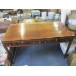 A Victorian mahogany twin drawer desk, standing on square, tapered legs, 30 1/2"h x 54"w