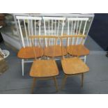 Three 1960s retro Ercol white painted bar back chairs, tamped British standard mark underneath