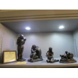 A group of four Heredities, bronzed composition figurines to include The Kiss by Karin Jongen,