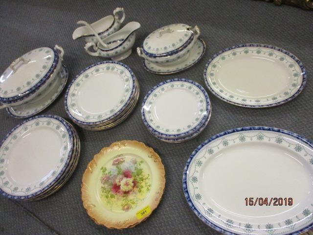 A Royal Doulton 26-piece dinner service and two floral decorated plates