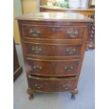 An early 20th century small, bow fronted chest of four graduated drawers, 30" h x 18 1/2"w