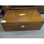 A Victorian rosewood writing slope with fitted interior and a pair of silver plated, topped inkwells