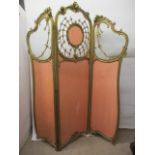 A late 19th century gold painted, carved wooden, three fold screen, with floral and scroll carved