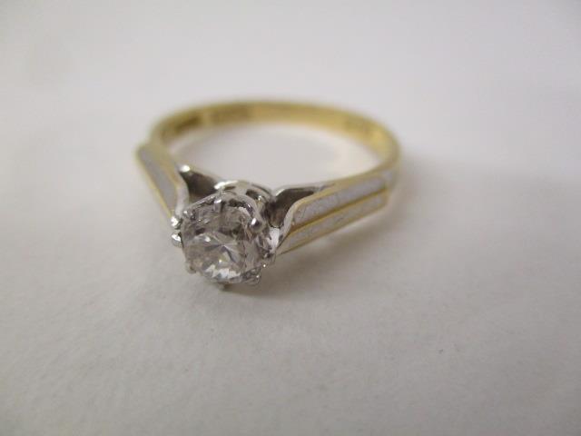 A gold and platinum coloured metal solitaire diamond ring, approximately 3.5ct, stamped 18ct plat,